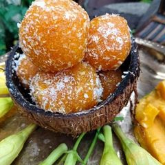 A picture of Mango coconut ladoo.
