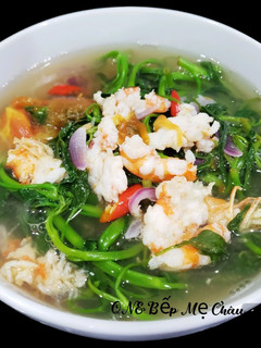 A picture of Vietnamese Sour Soup with Water Spinach.