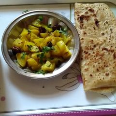 A picture of Breakfast with aloo ki sabzi.