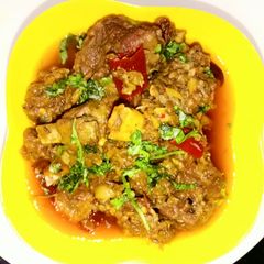 A picture of Gota Mosha Mangsho/Mutton with Whole Spices.