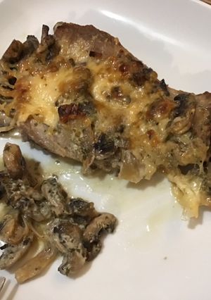 A picture of Baked Pork Chops with Shallots, Cream, and Mushrooms.