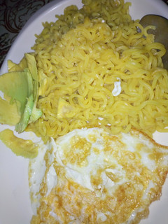 A picture of Noddles, pan egg and avocado.