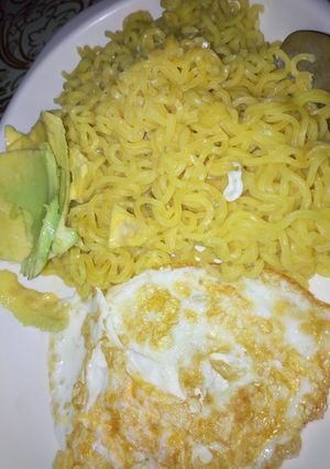 A picture of Noddles, pan egg and avocado.