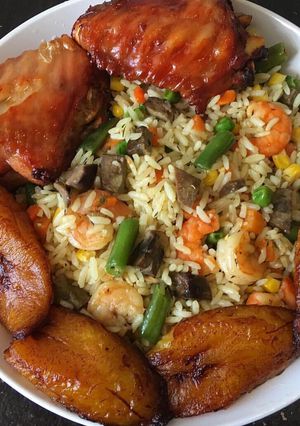 A picture of Fried rice with plantain.