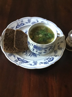 A picture of California Farm Pea Soup with Rye Bread.