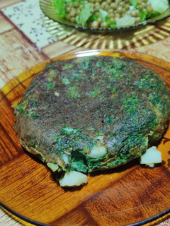 Una foto de Tortilla de espinaca y papas