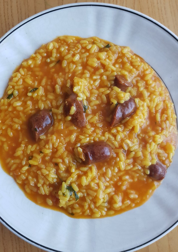 Una foto de Arroz caldosito con salchichas de ternera