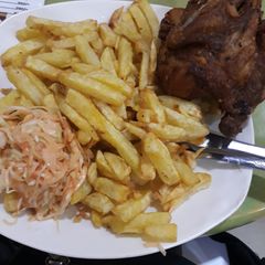 A picture of Deep fried chips and kuku.