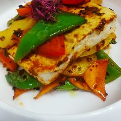 Spicy paneer steak with charred bell peppers A picture of Spicy paneer steak with charred bell peppers.