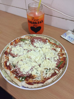 Una foto de Pizza casera muy sencilla
