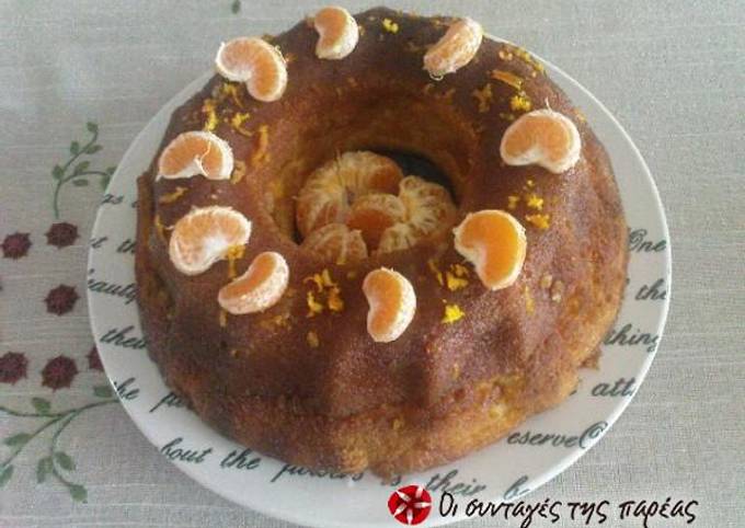 κύρια φωτογραφία συνταγής Σιροπιαστό κέικ μανταρινιού με παπαρουνόσπορο