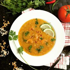 A picture of Lentil Oats Porridge with Tomatoes and Prawns.