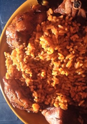 A picture of Jellof rice and chicken.