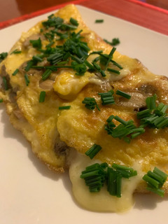 Una foto de Omelette champiñón queso