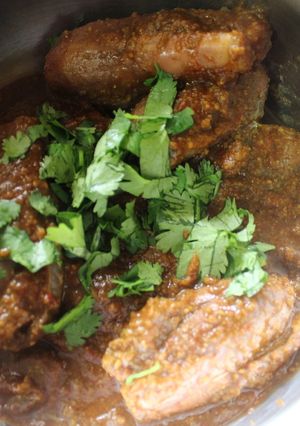 A picture of Andhra Style Gutti Vankaya Pulusu Koora /Stuffed Brinjal Gravy Curry.