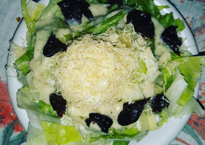 Steps to Make Speedy Salad with Cezarian Dressing,Cheese and Dried Plums
