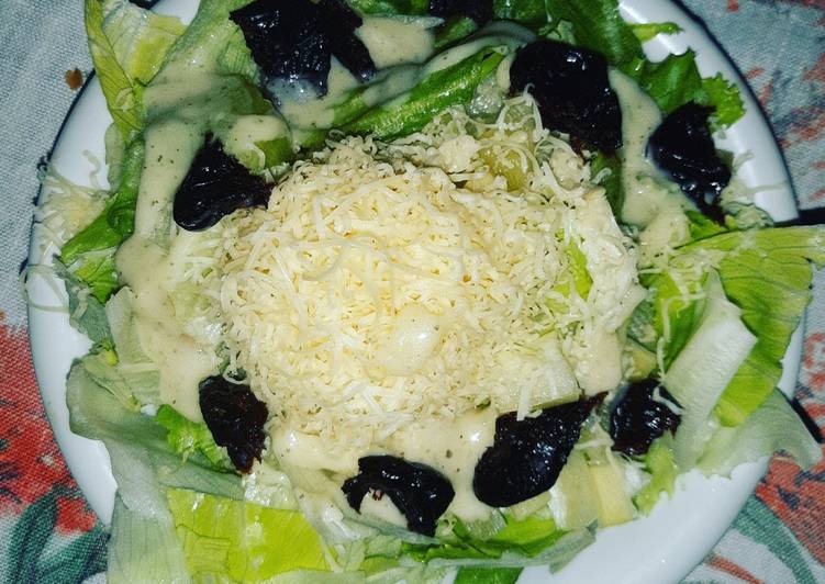 Recipe of Delicious Salad with Cezarian Dressing,Cheese and Dried Plums
