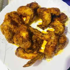 A picture of Chicken wings with spiced melted butter glaze.