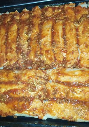 Una foto de Canelones de ricota, espinaca, jamón y queso 🌯😉