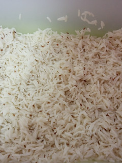 Una foto de Arroz con comino de acompañamiento