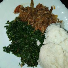 A picture of Omen stew served with kales.