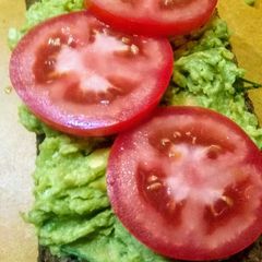 A picture of Garbanzo Avocado open Faced sandwich.