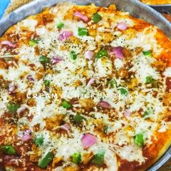 A picture of Chicken Tikka pizza.