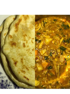 A picture of Naan bread and chicken and potatoes curry.
