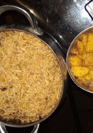 A picture of Brown rice and fried potatoes.