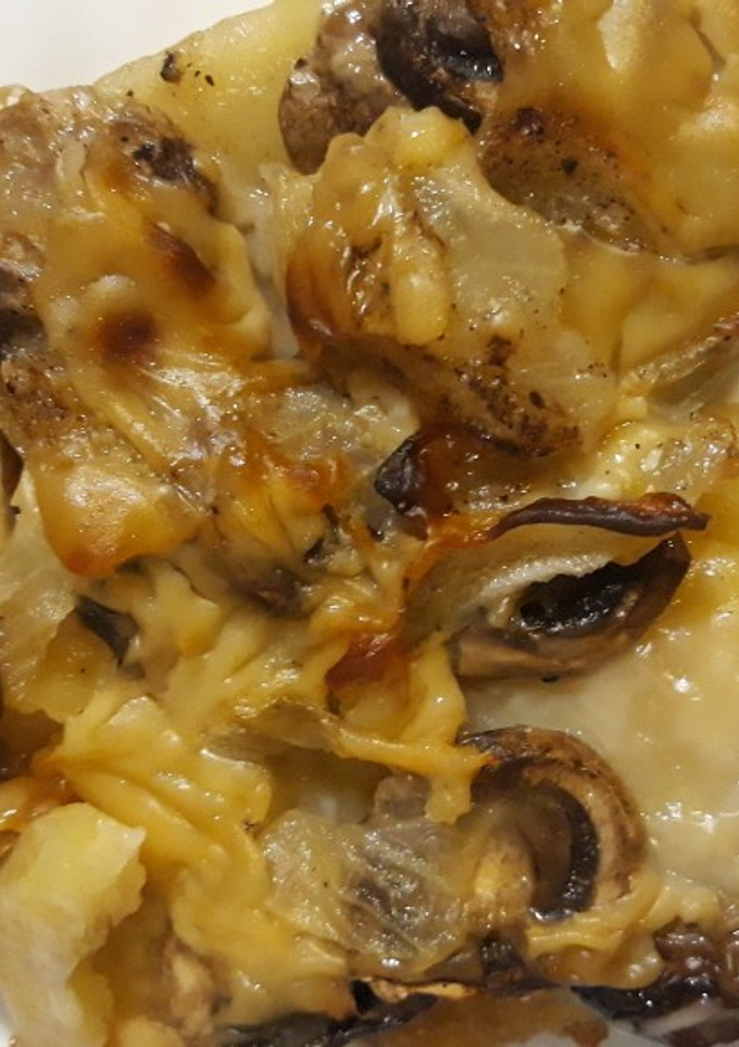 Una foto de Papas con champiñones al horno