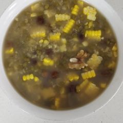 A picture of Corn and Mung Bean Soup with Raisins and Walnuts.