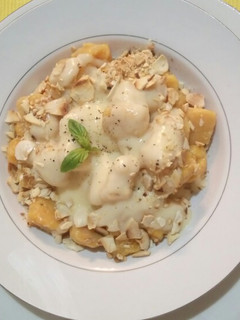 Una foto de Ñoquis de Calabaza con salsa blanca!