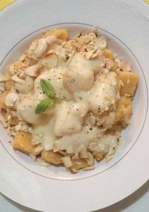 Una foto de Ñoquis de Calabaza con salsa blanca!