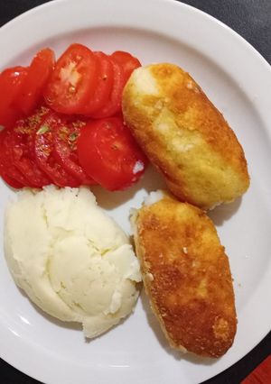 Una foto de Bombas de papa rellenas de pacu