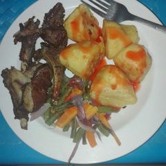 A picture of Pan grilled mutton ribs, Roasted potatoes with veggies.