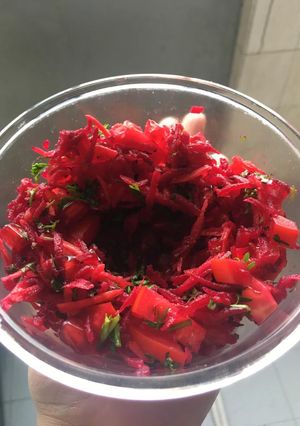 A picture of Shredded carrot, beet & pomegranate salad.