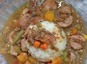 Una foto de bondiola de cerdo arroz