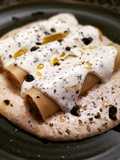 Canelones de merluza, puré de fessolets y bechamel de olivada