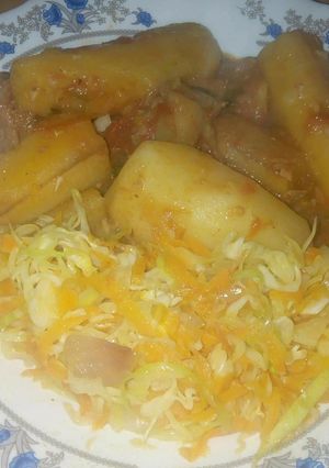 A picture of Matoke with steamed cabbage.