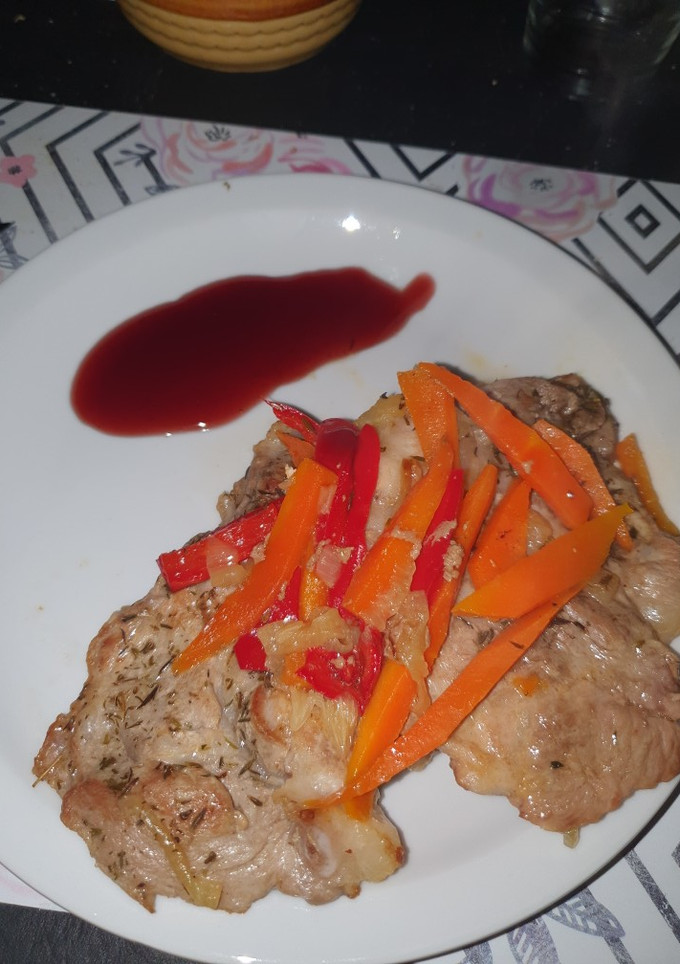 Una foto de Bondiola de cerdo agridulce con salsa reducción de malbec