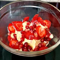 A picture of My Cornish Dairy Ice Cream, Fresh Strawberries + Pomegranate 😍.