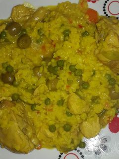Una foto de Arroz meloso de pollo