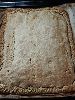 Una foto de Empanada de verdura y embutido
