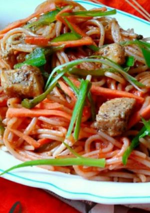 A picture of Chicken colorful spaghetti.