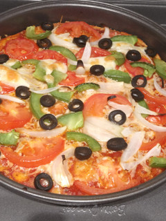 A picture of Veg Pizza 🍕.