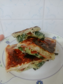 Una foto de Empanada de espinacas y jamón