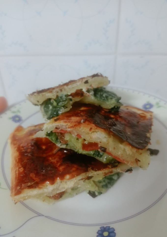 Una foto de Empanada de espinacas y jamón