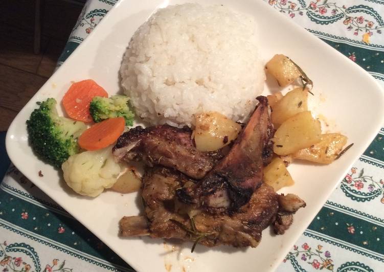 Costolette di maiale alla birra con patate