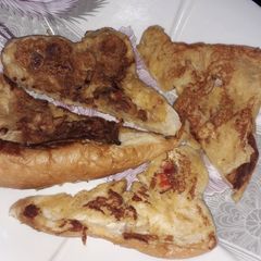 A picture of Fried egg and bread.