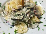 Una foto de recetas para raviolis rellena de queso